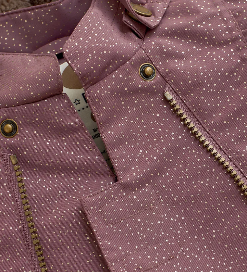 En Fant Flyverdragt - Rose Taupe m. Guldprikker