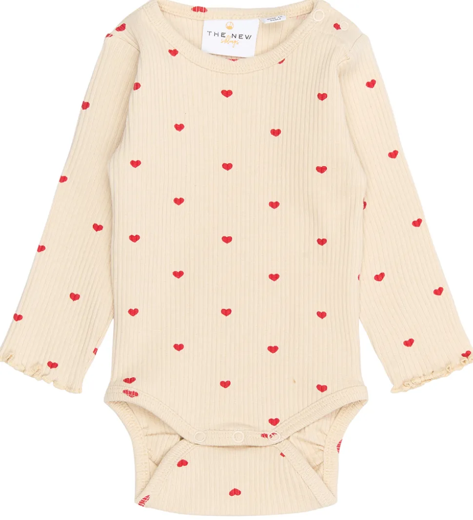 The New Siblings Body l/æ - TnsbRhea - Rib - Gardenia AOP